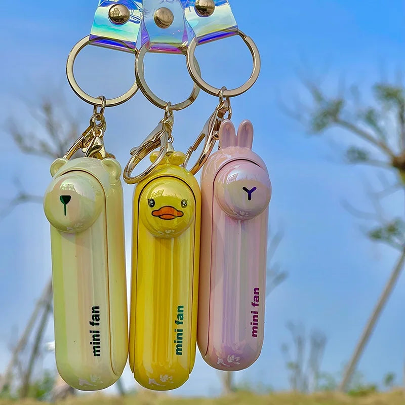 Compact Rechargeable Cute Handheld Fan: Foldable, USB-Powered Cooling on the Go