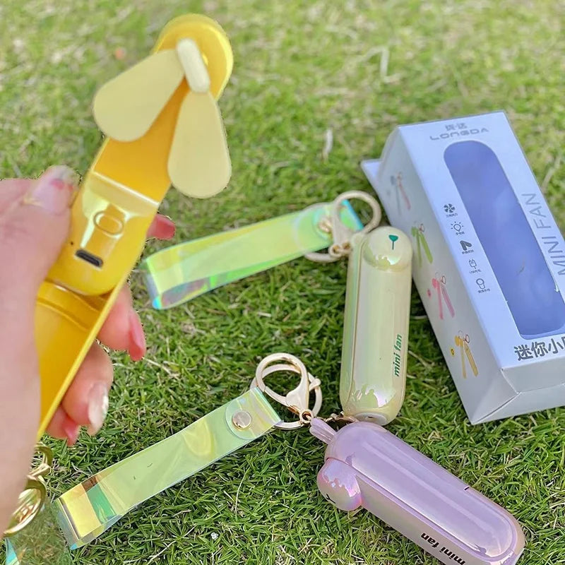 Compact Rechargeable Cute Handheld Fan: Foldable, USB-Powered Cooling on the Go